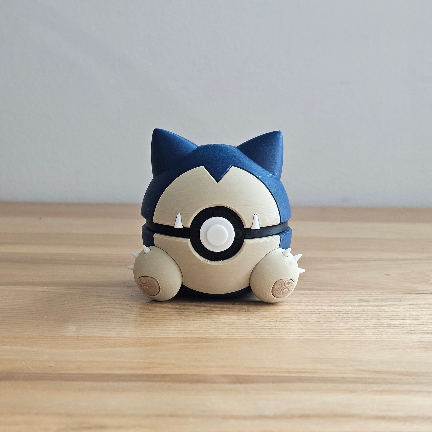 #11 Metapod, #143 Snorlax, #60 Poliwag, #54 Psyduck